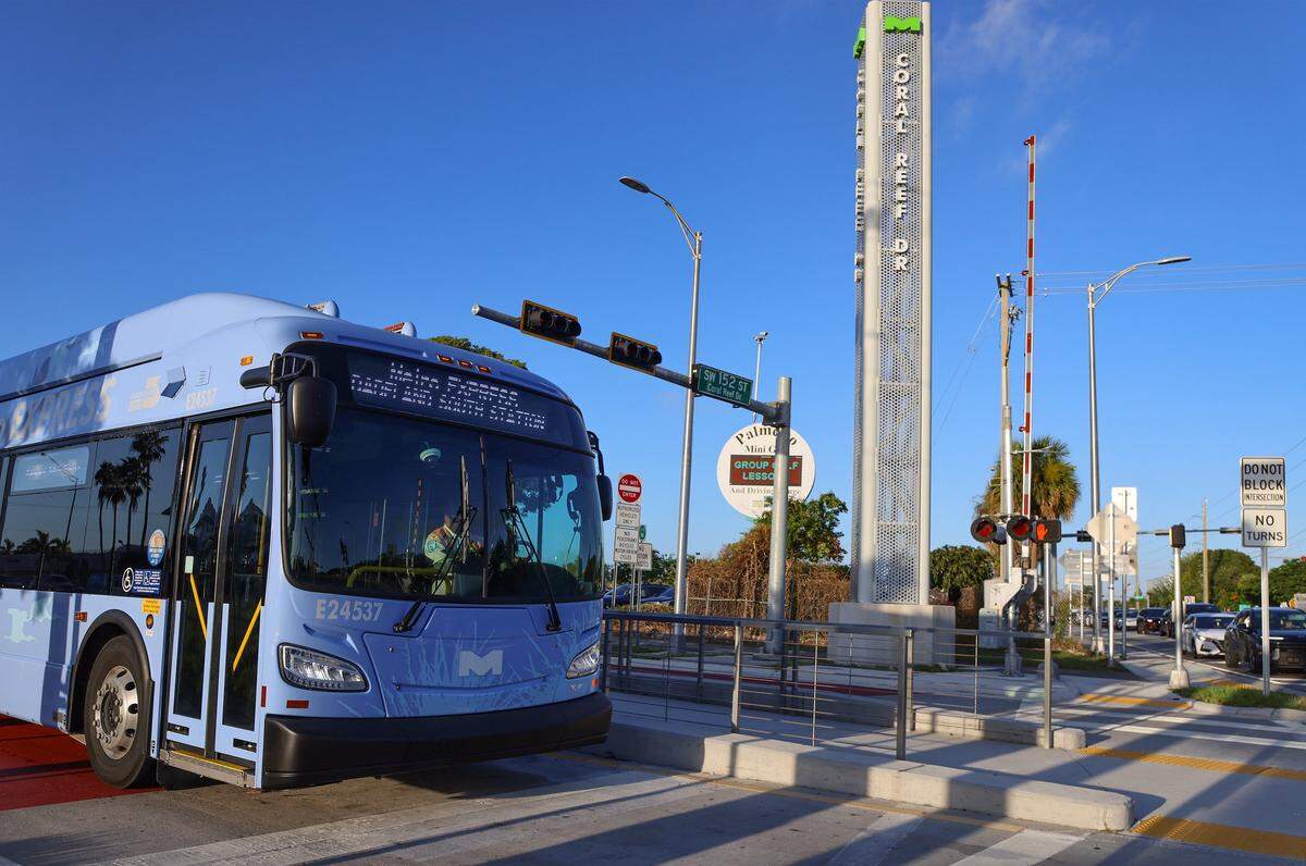 A express bus exits the station only to stop for a red light on the first day of Miami-Dade's $300 million rapid-transit bus line known as “Metro Express” on Monday, October 27, 2025, as it exist the 152 Street Station just west of Richmond Heights on Coral Reef Drive and U.S. 1. Many first day riders complained about crowded buses and long travel times due to red lights on the express lane.