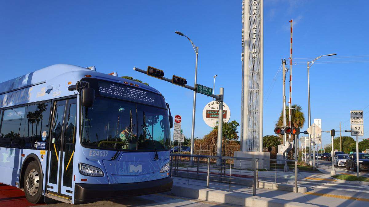A express bus exits the station only to stop for a red light on the first day of Miami-Dade's $300 million rapid-transit bus line known as “Metro Express” on Monday, October 27, 2025, as it exist the 152 Street Station just west of Richmond Heights on Coral Reef Drive and U.S. 1. Many first day riders complained about crowded buses and long travel times due to red lights on the express lane.