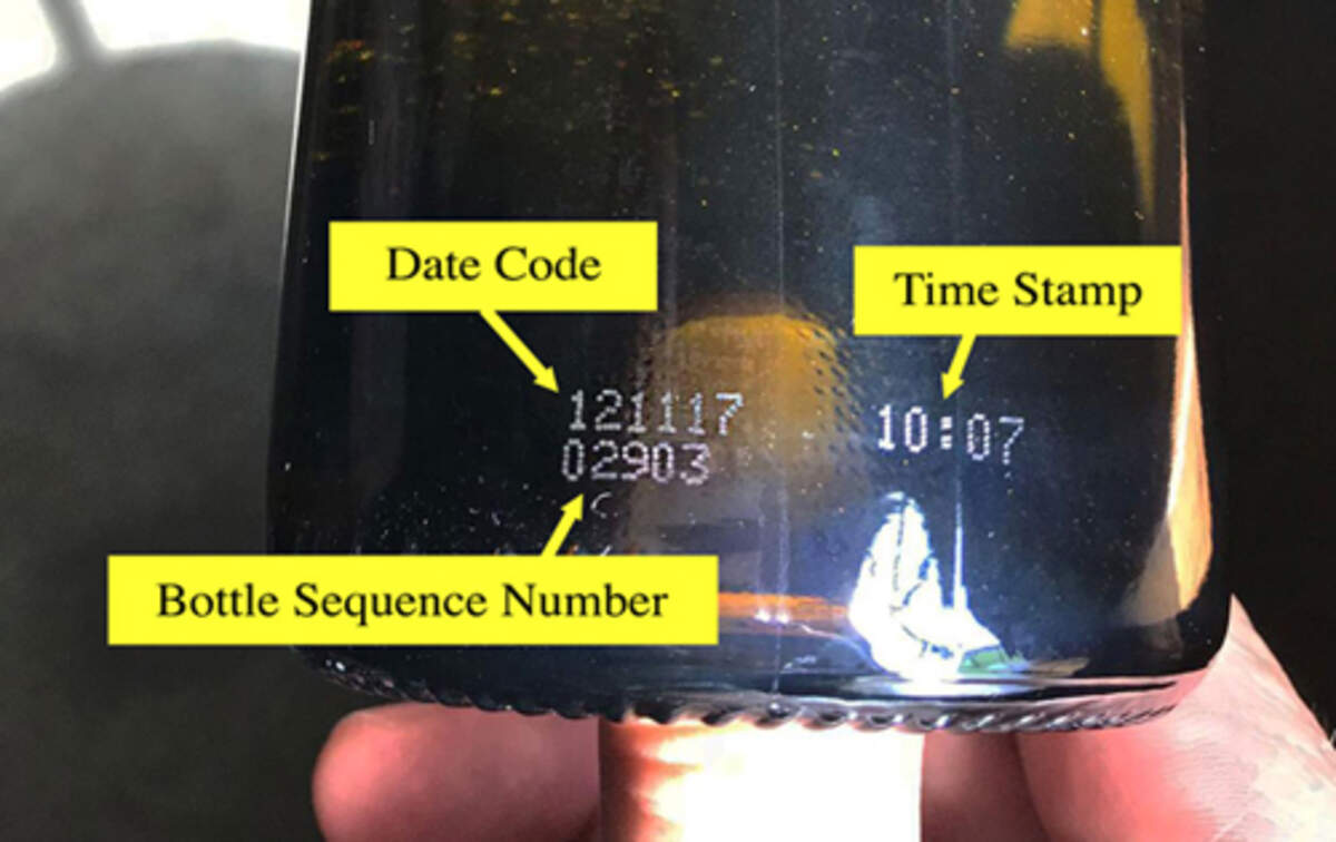 Where to find the date codes on the bottles of wine to determine whether or not they're included in this recall