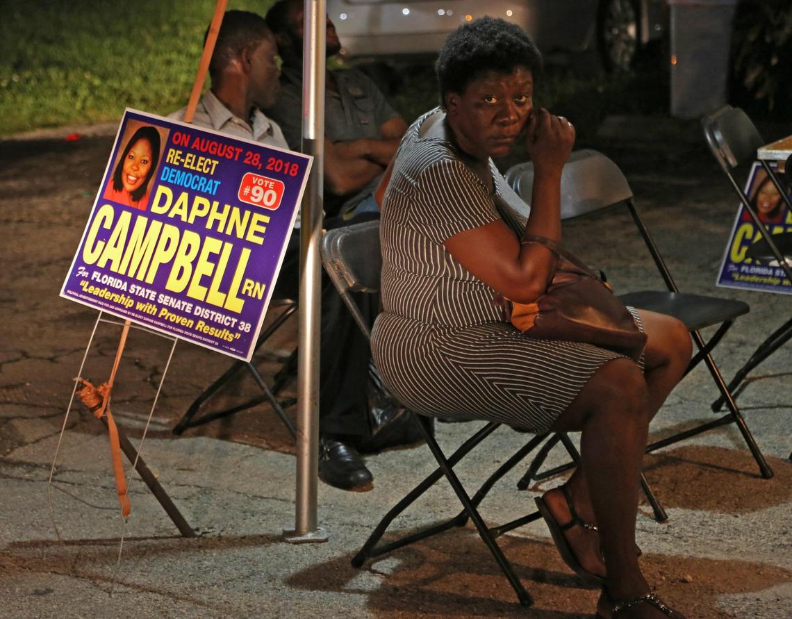 Daphne Campbell supporter Elenne Polycarpe waits for Campbell’s arrival at a watch party.  Campbell lost the Florida Senate District 38 primary race in North Miami.