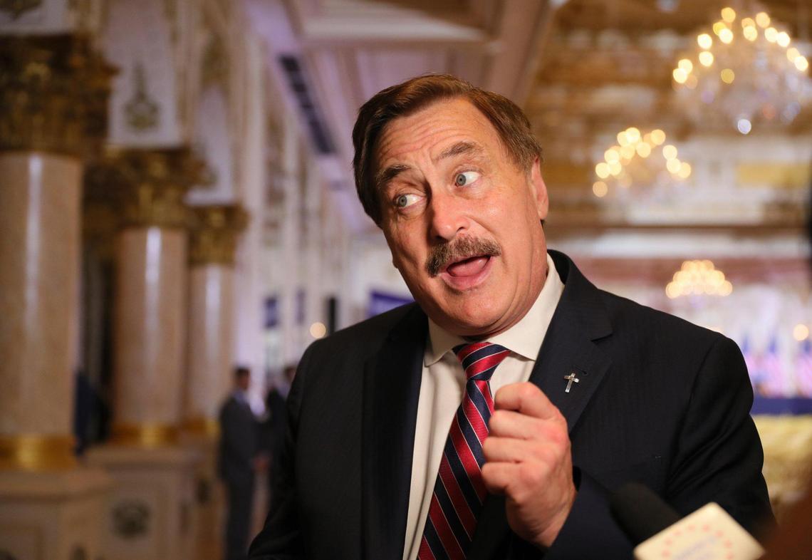 My Pillow CEO Mike Lindell speaks to reporters before former President Donald Trump makes a special announcement from his Mar-a-Lago club in Palm Beach, Florida on Tuesday, November 15, 2022.