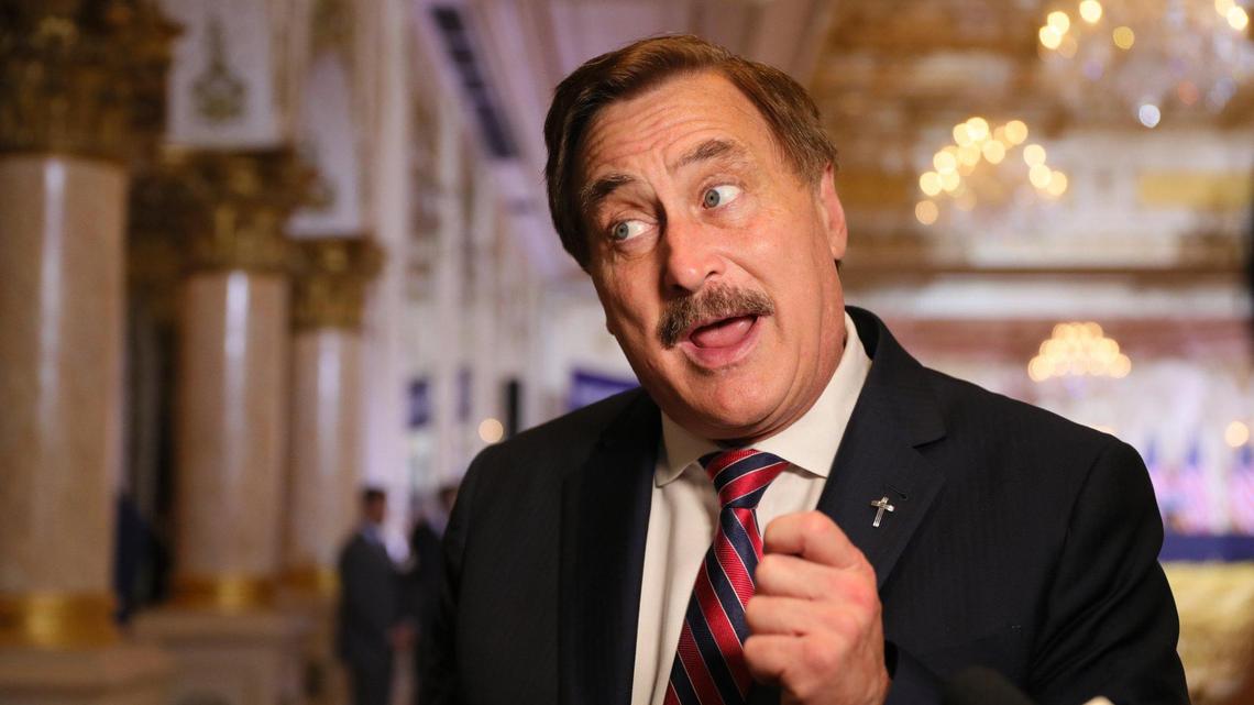 My Pillow CEO Mike Lindell speaks to reporters before former President Donald Trump makes his 2024 presidential announcement from his Mar-a-Lago club in Palm Beach, Florida, on Tuesday, Nov. 15, 2022.
