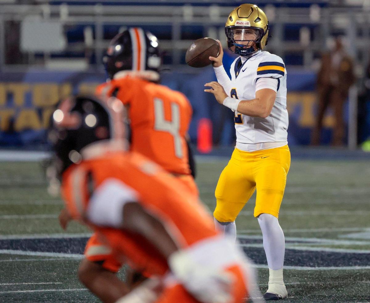 St. Thomas Aquinas quarterback Andrew Indorf (2) sets up to pass during the game against Lakeland Dreadnaughts in the first half during the Florida High School Football State Championships - Class 5A game at Pitbull Stadium on the campus of Florida International University in Miami, Florida, on Thursday, December 12, 2024.