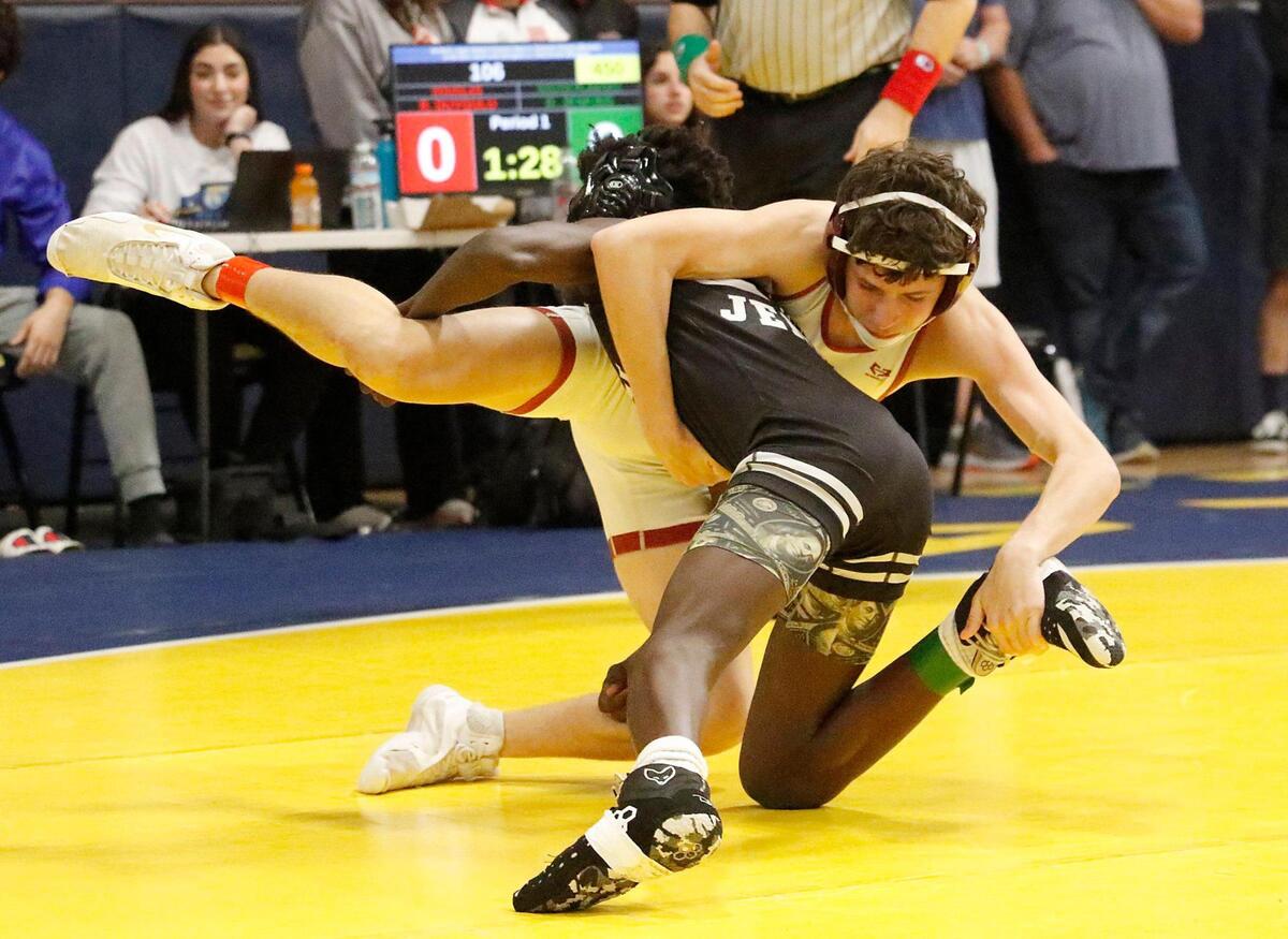 Rocco Duygulu, Douglas HS, (on top), wrestles Donovan Jenkins, South Plantation during 106 lb 2024 BCAA Wrestling Championship on Saturday, February 3, 2024 at Pompano Beach HS in Pompano Beach. Andrew Uloza / for Miami Herald