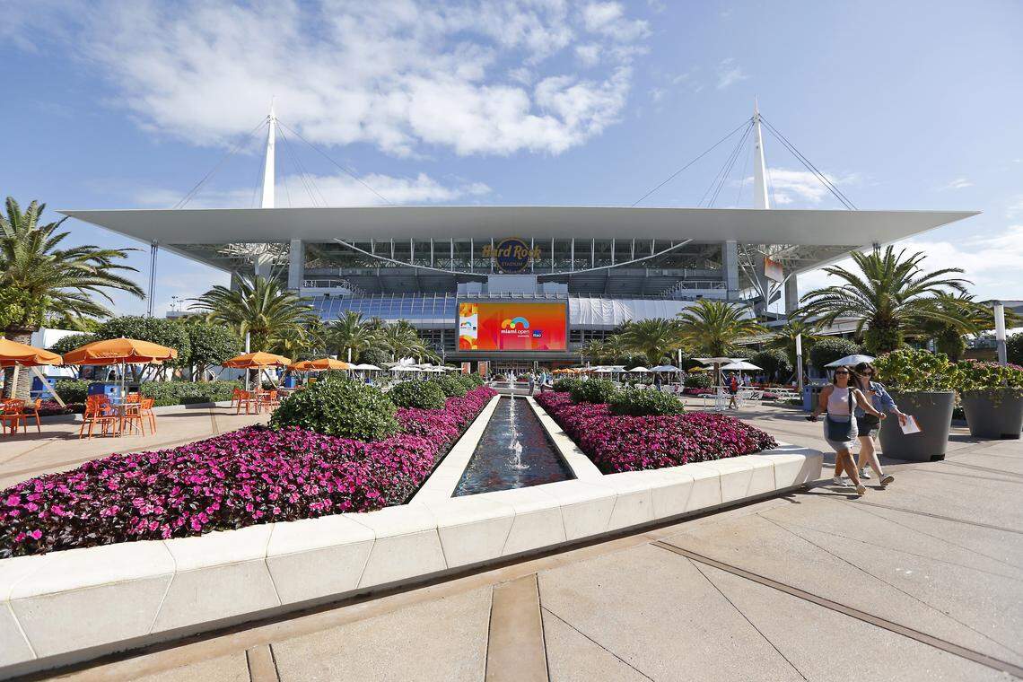 Tennis fans walk outside the stadium during the fourth day of the Miami Open tennis tournament on Thursday, March 21, 2019, at Hard Rock Stadium in Miami Gardens.