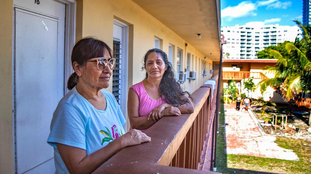 Georgina Gonzalez, left, and Elsa Manjivar are residents being forced out of an Edgewater apartment building at 455 NE 33rd St. by developers Aimco and Beitel. They are worried they won’t be able to find another affordable home.