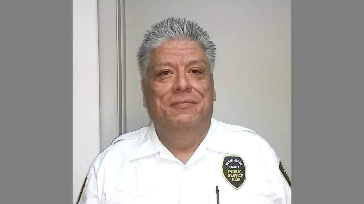 Pablo Espinoza, a Miami-Dade police aide, is on administrative duties while the department investigates allegations he made a racist comment about a Miami-Dade schools police sergeant.