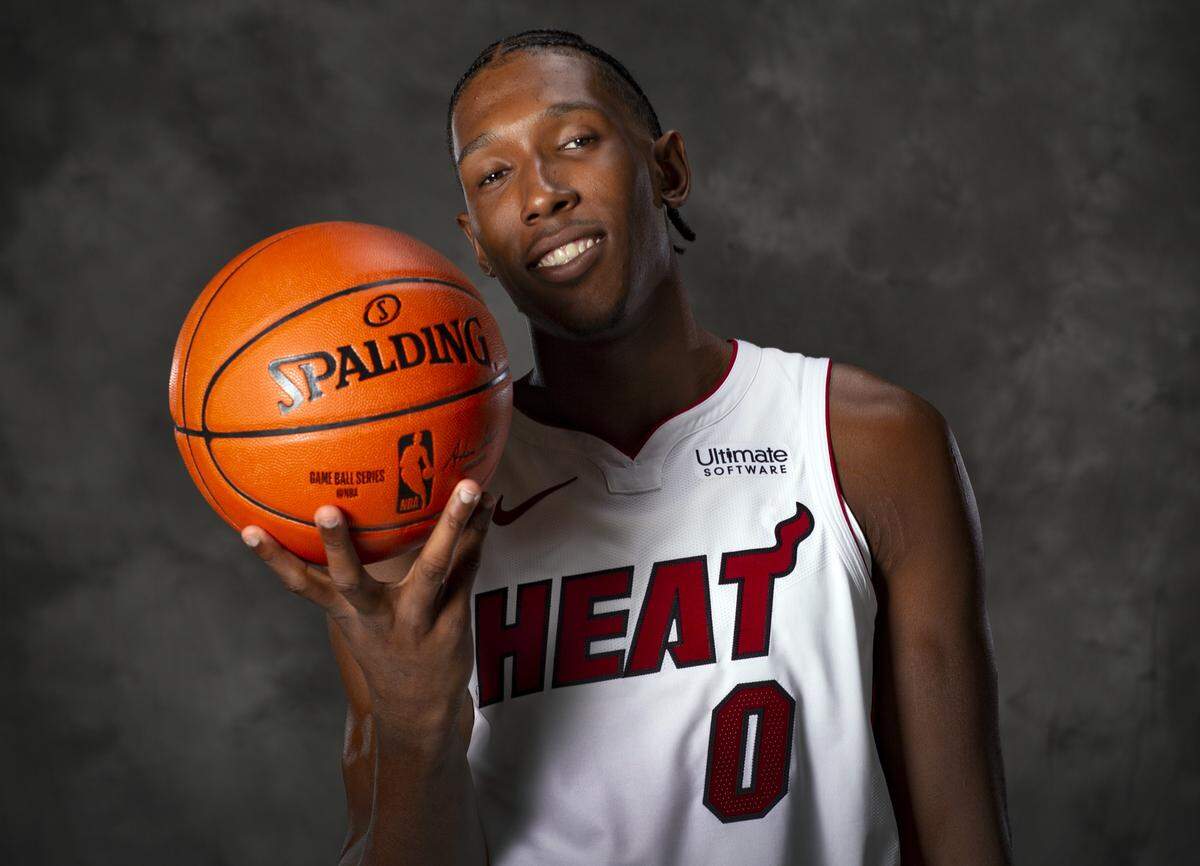 Miami Heat’s Josh Richardson (0) poses for a photograph during Miami Heat media day at the American Airlines Arena in Miami on Monday, September 24, 2018.