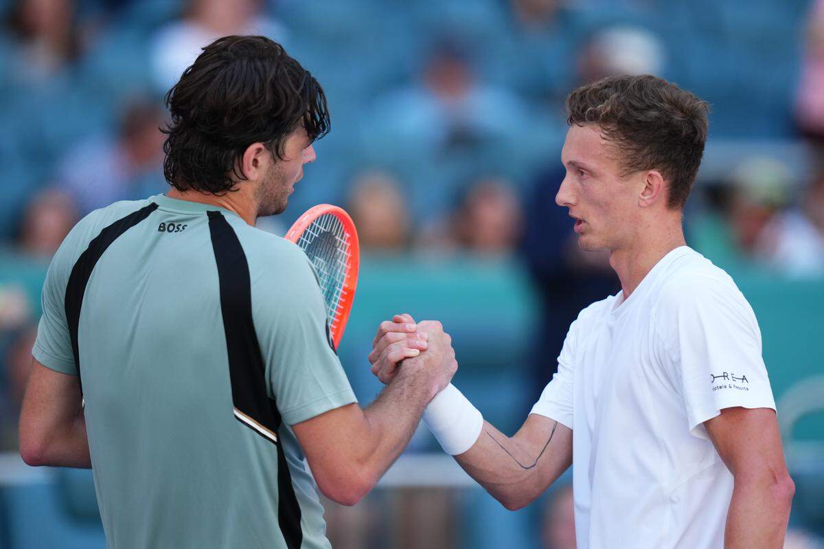 MIAMI GARDENS, FLORIDA - MARCH 24: Taylor Fritz of the United States and Jiri Lehecka of Czechia shakes hands at the end of their match during day 8 of the Miami open at Hard Rock Stadium on March 24, 2026 in Miami Gardens, Florida. (Photo by Rich Storry/Getty Images)