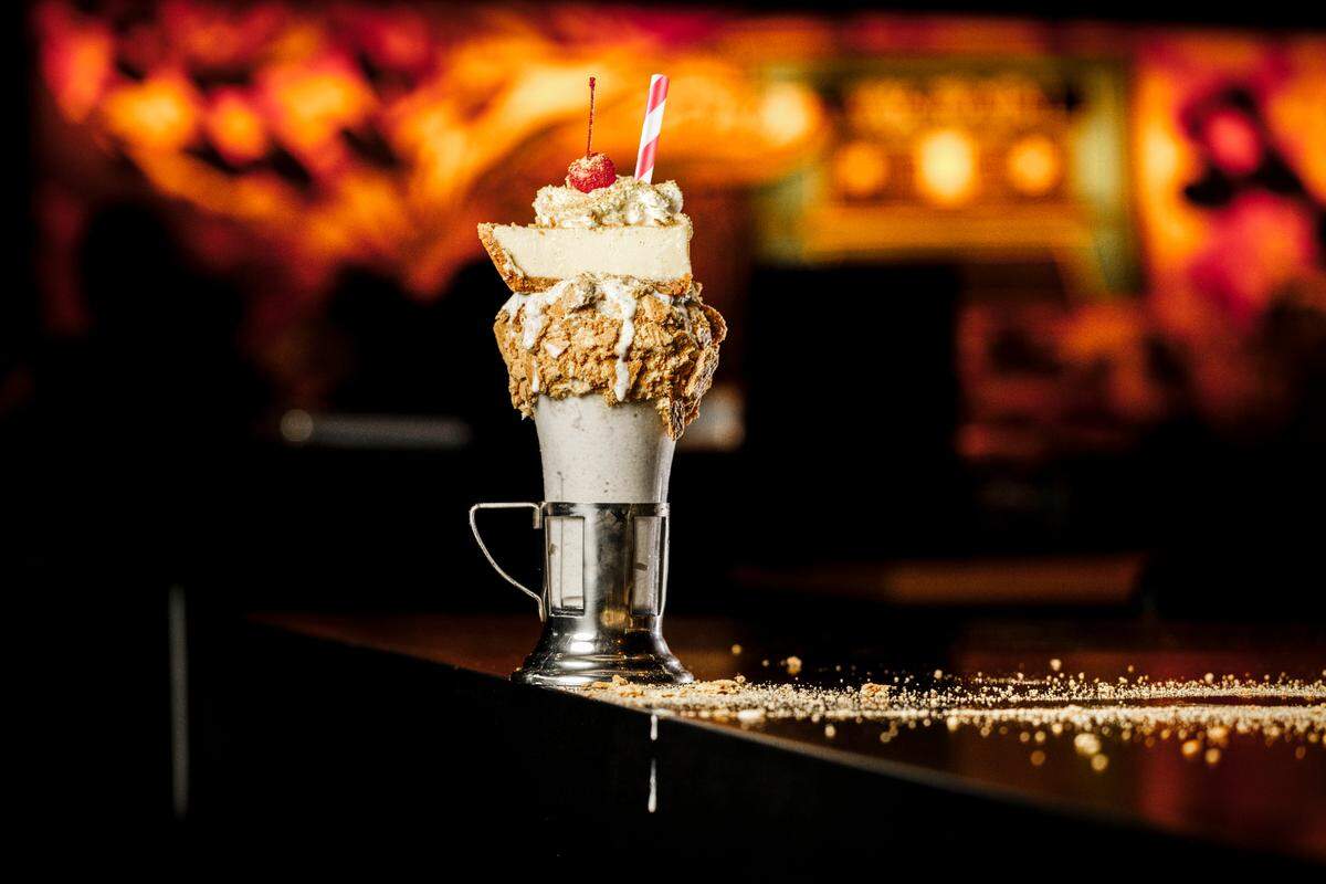 The limited-edition Key Lime Pie shake with a slice of pie on top at Black Tap Craft Burgers & Beer in Miami.