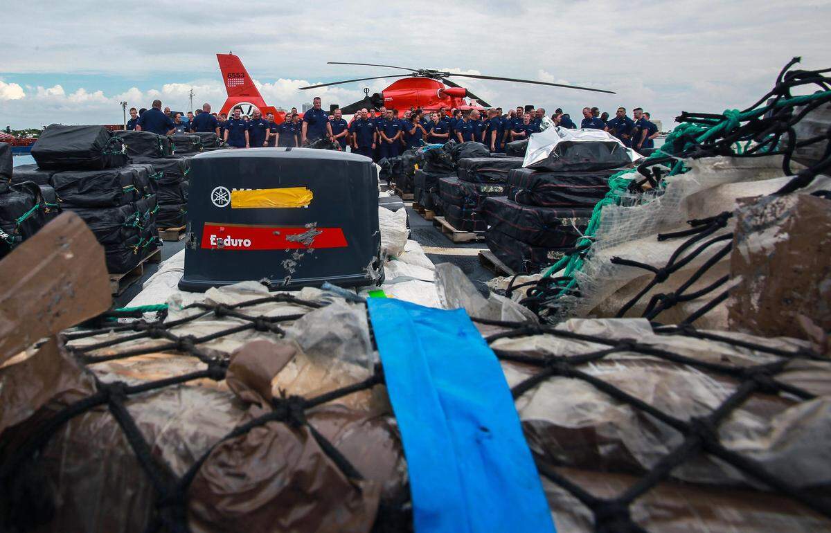 Members of the U.S. Coast Guard offload approximately 37,000 pounds of cocaine at Port Everglades on Thursday, Nov. 15, 2018.