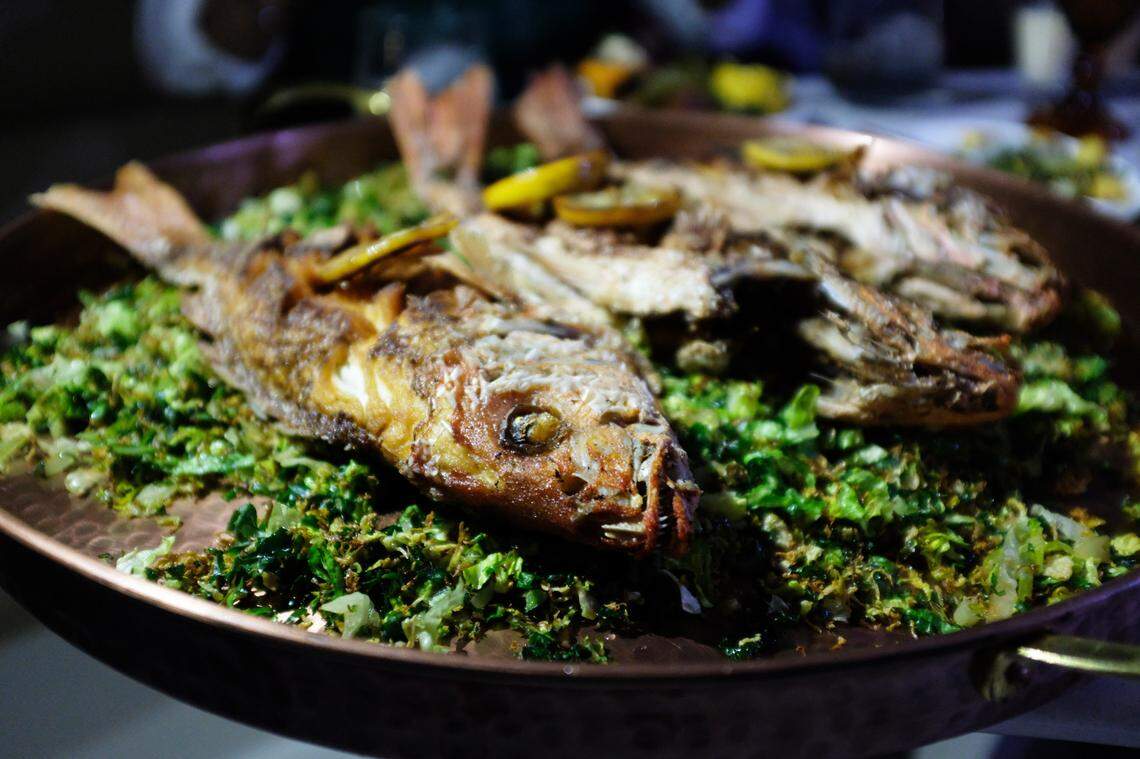 Chef Adrianne Calvo previewed some of the dishes she would offer at the renovated Red Fish restaurant, including whole snapper.