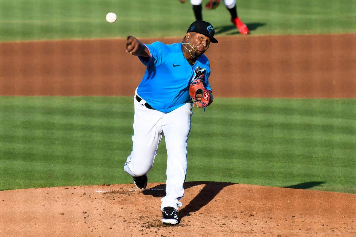Miami Marlins pitcher Sixto Sanchez throws in the first inning of a spring training game against the Washington Nationals on Thursday, March 25, 2021, at Roger Dean Chevrolet Stadium in Jupiter, Florida.