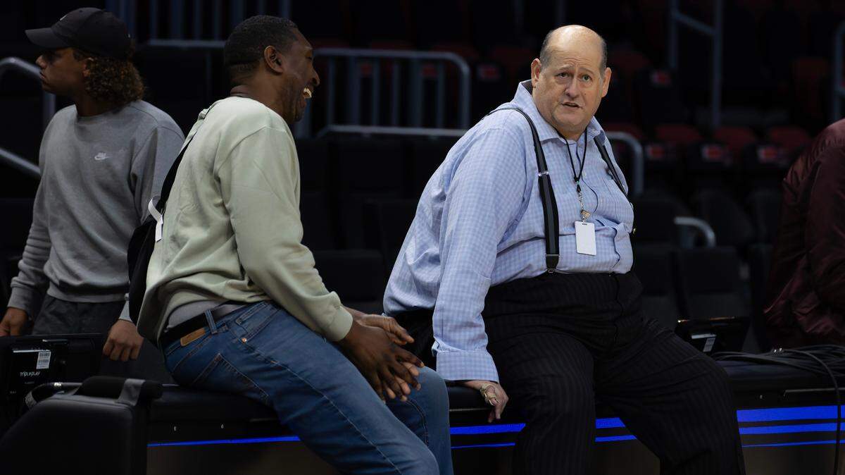 Miami Heat Executive Vice President of Basketball Operations and General Manager Andy Elisburg chats with Washington Wizards scout Laron Profit before their game against the Milwaukee Bucks at Kaseya Center in Miami on April 5, 2025.