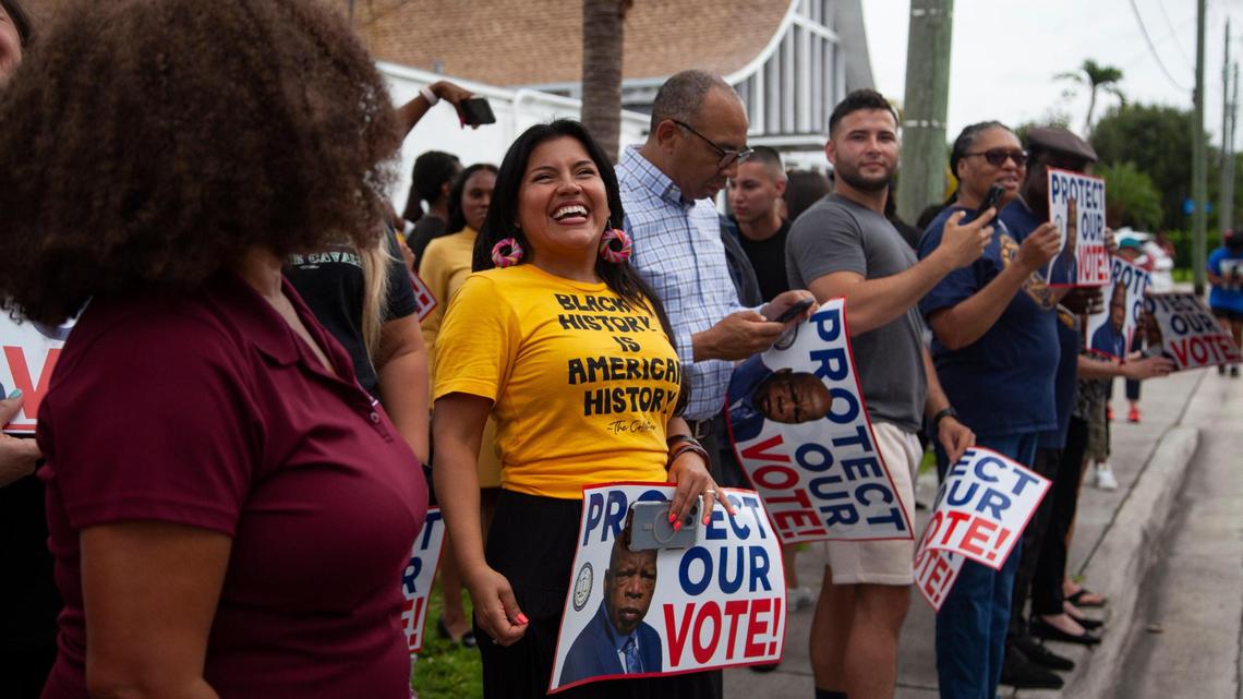 Karla Hernandez Mats, United Teachers of Dade president, smiles as the Stay Woke Florida bus tour arrives at Mt. Olive Missionary Baptist Church on Thursday, June 22, 2023 in South Miami, Florida.