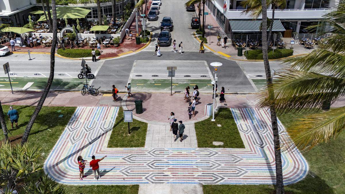 The rebuilt LGBTQ+ crosswalk made of 3,606 colorful pavers have been installed and unveiled at Lummus Park on Friday, April 10, 2026. The installation was created less than six months after the Florida Department of Transportation removed the original crosswalk at 12th Street and Ocean Drive in Miami Beach, Florida.