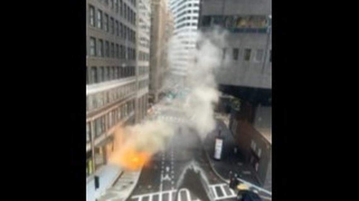 Two manhole explosions in Boston, Massachusetts created scenes of chaos, videos show. The cause of the blasts are being investigated, a fire official said.