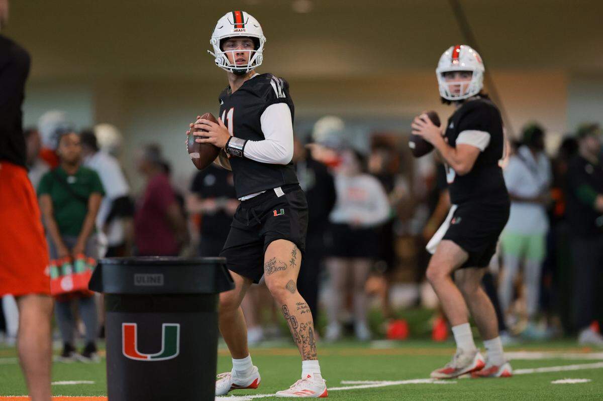 Miami Hurricanes quarterback Carson Beck (11) works out during spring practice at the Carol Soffer Indoor Practice Facility at the University of Miami in Coral Gables, Florida, Monday, March 3, 2025.