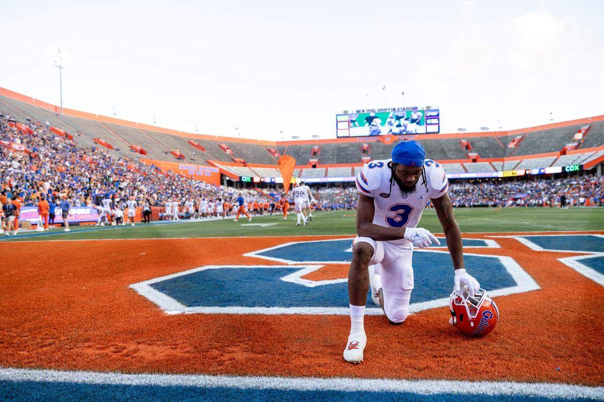 Florida Gators wide receiver Xzavier Henderson (3) prays before the game during the Florida Gators Orange and Blue Spring Game at Steve Spurrier Field at Ben Hill Griffin Stadium in Gainesville, FL on Thursday, April 13, 2023. [Matt Pendleton/Gainesville Sun] Ncaa Football Florida Gators Orange Blue Spring Game