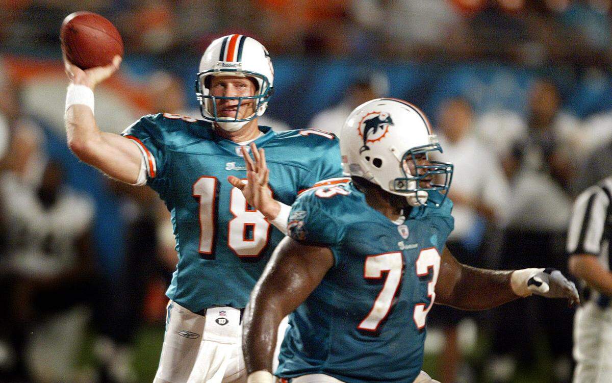The Miami Dolphins host The Jacksonville Jaguars at Pro Player Stadium in Miami on Aug. 14, 2004 .Sage Rosenfels throws complete to the 20 for 1st down in the fourth quarter.