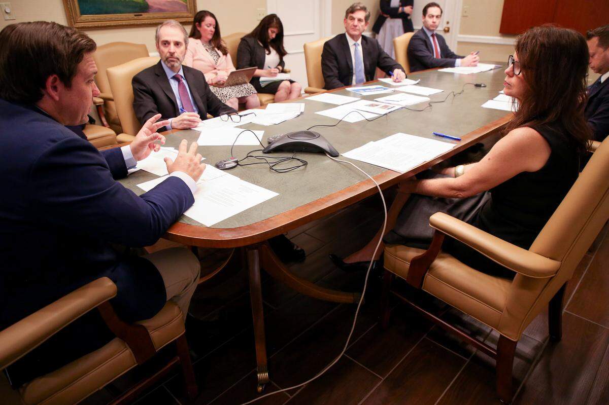 Gov. Ron DeSantis holds a conference call with the Re-Open Florida Task Force at the Capitol on Monday, April 20, 2020.