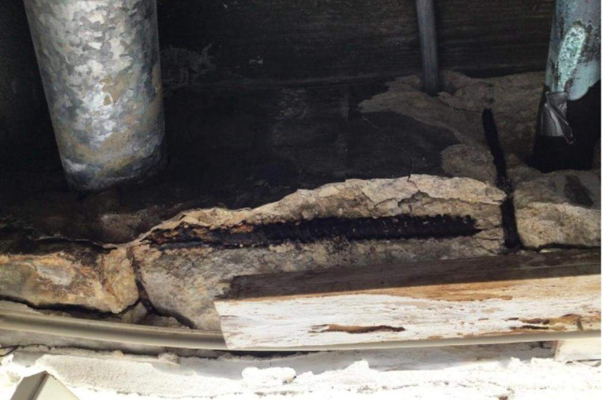 Concrete spalling with exposed rebar is seen in the boiler room of the Forum apartment building, 1080 93rd St., in Bay Harbor Islands. The 1965 building was evacuated Wednesday, Sept. 1, 2021, due to safety concerns.