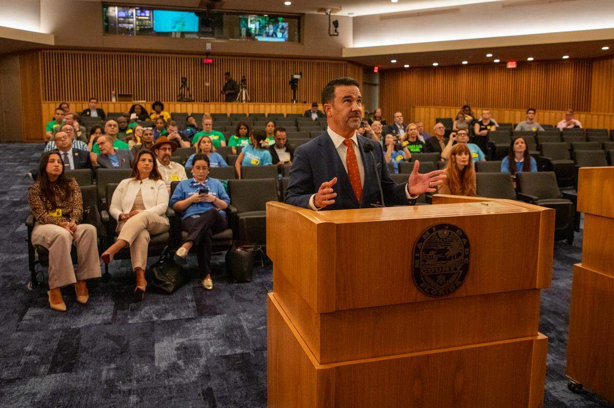Joe Jimenez, a representative from “Okeechobee Solutions,” presents a map of where the fourth incinerator site, a tree farm owned by David Martin, would go.
