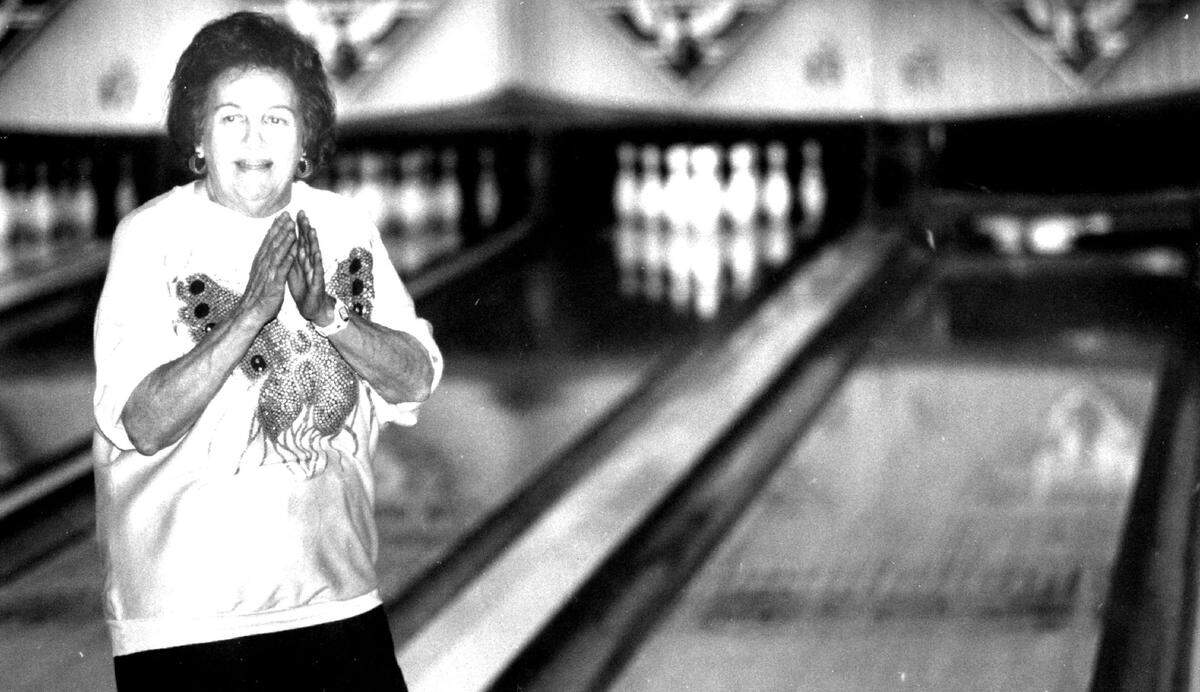 Ibra Nauritz shows her excitement after hitting a strike at Cloverleaf Lanes in near North Miami Beach. Nauritz was bowling with the super seniors league in 1993.