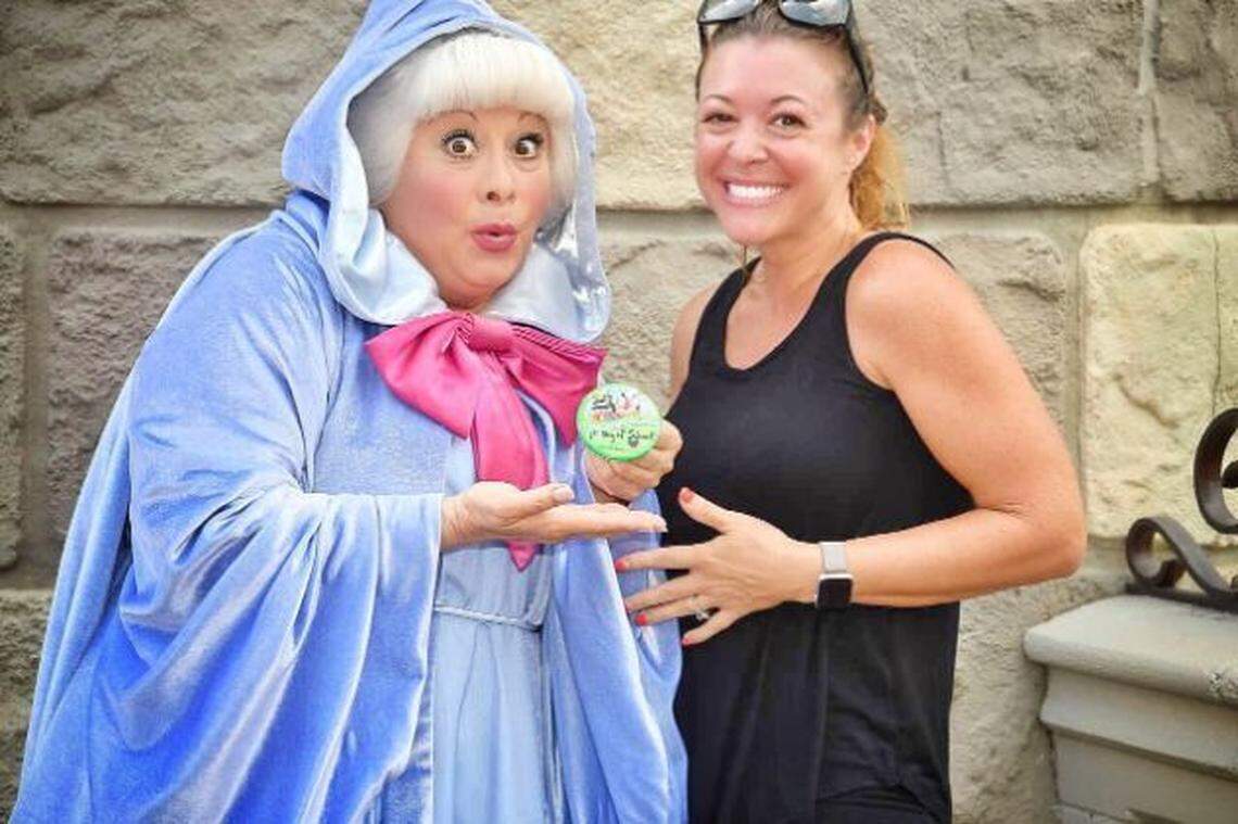 Lisa DiNoto posed with the Fairy Godmother during a trip to Disney. She was celebrating her kids being back in school.