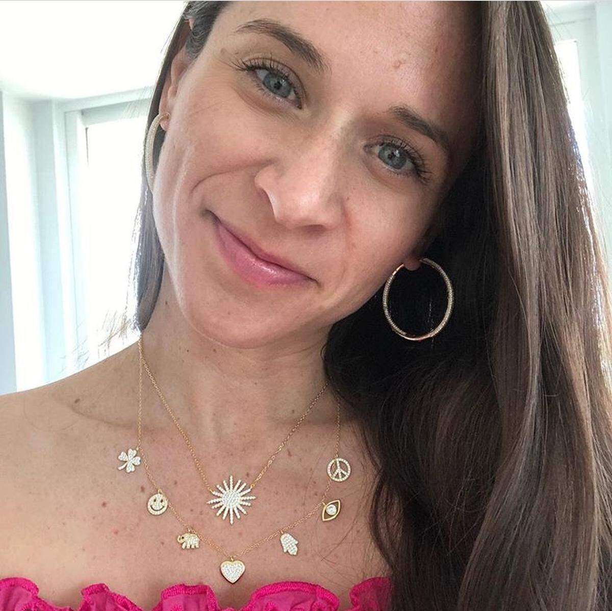 Jaimie Nicole Scheiner shows off jewelry from her line, Jaimie Nicole.