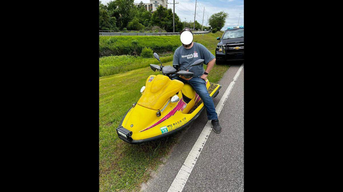 A man driving a jet ski like a motorcycle was pulled over on an Alabama highway and police were surprised to learn the contraption was street legal.