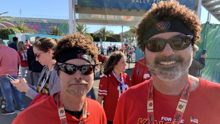 Headbands, bling, flags: 49ers and Chiefs fans representing their teams (and country)