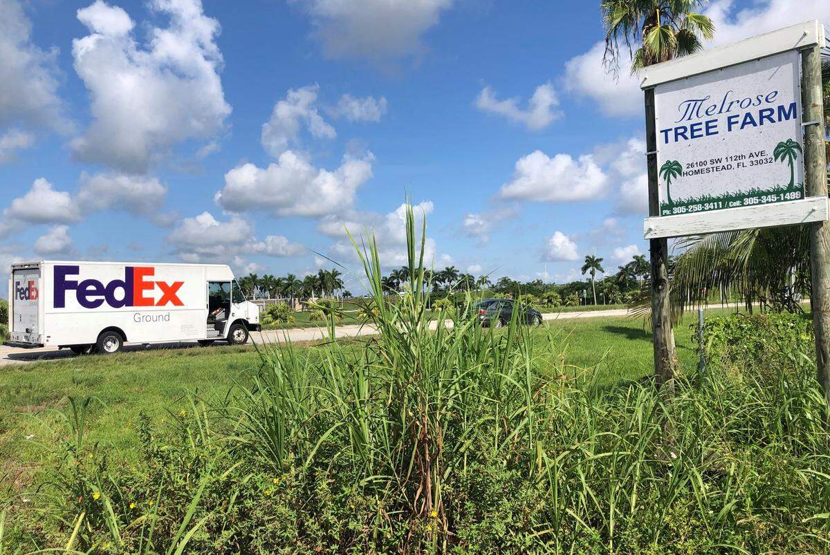 A FedEx truck drives through tree farms and other agricultural land that would become one of Miami-Dade County’s largest industrial parks under a proposal to move the Urban Development Boundary in South Miami-Dade to allow more commercial construction. Environmental groups oppose the plan.