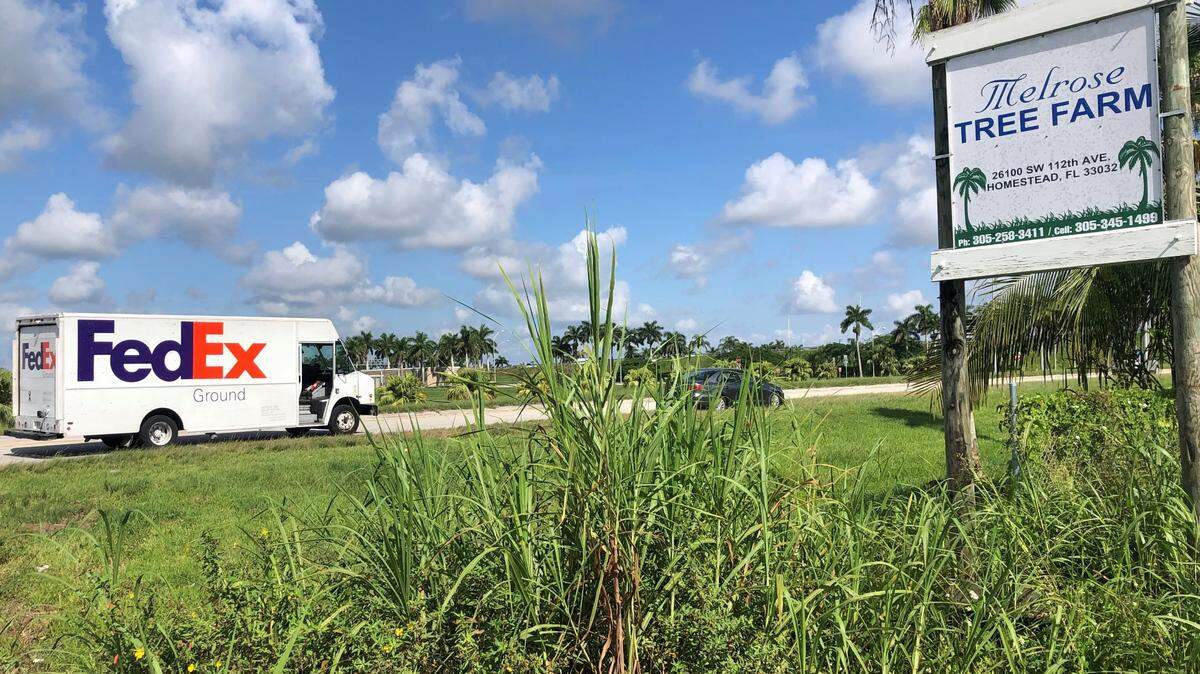 A FedEx truck drives through tree farms and other agricultural land that would become one of Miami-Dade County’s largest industrial parks under a proposal to move the Urban Development Boundary in South Miami-Dade to allow more commercial construction. Environmental groups oppose the plan.