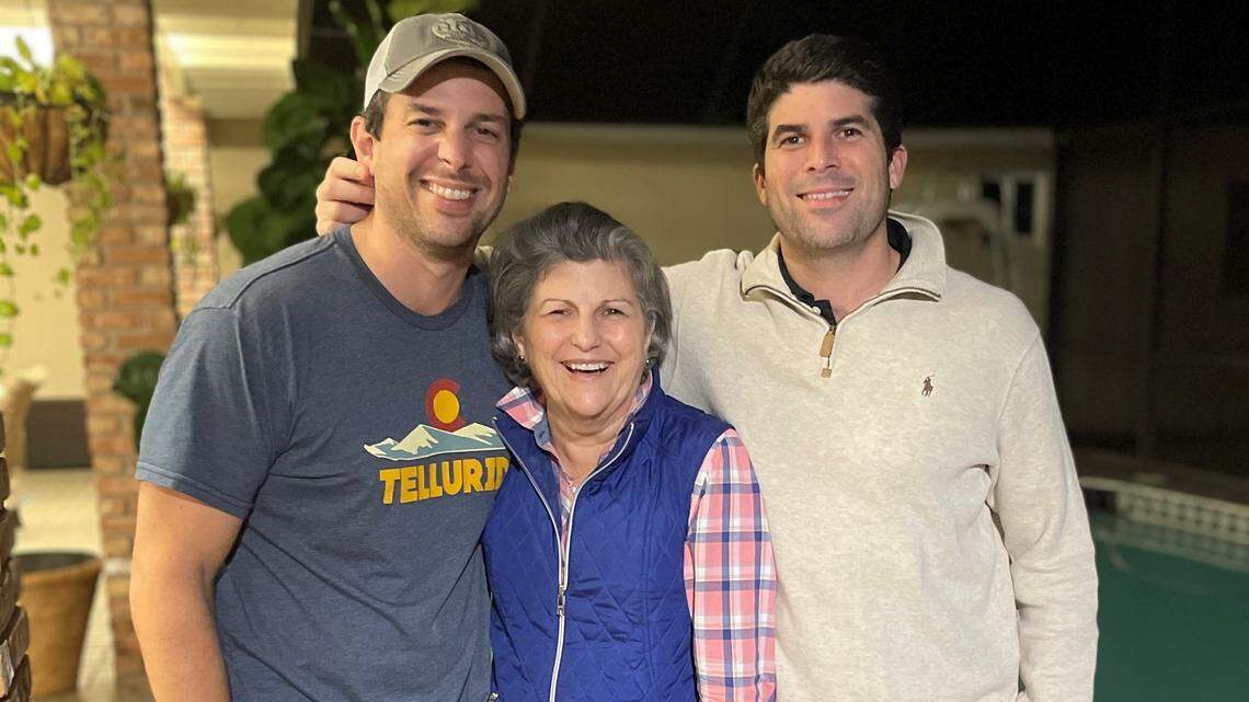 Rosa Saez, center, with sons Carlos, left, and Pedro. Born in Cuba, Saez, a grandmother to six, perished in the Surfside condo collapse on June 24, 2021.