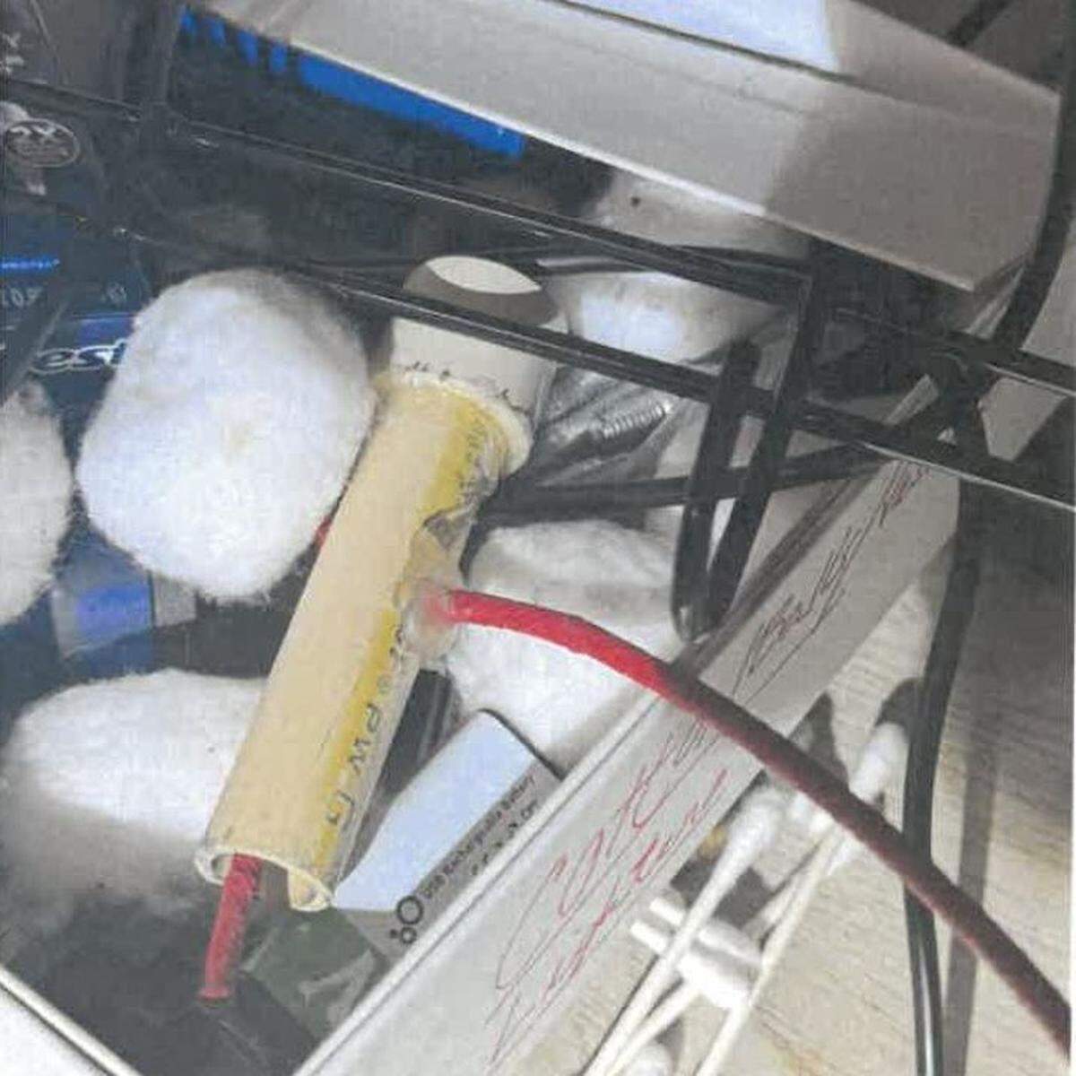 A pipe bomb with a red-colored fuse is shown in the apartment of a former Key West firefighter’s apartment on March 14, 2025.