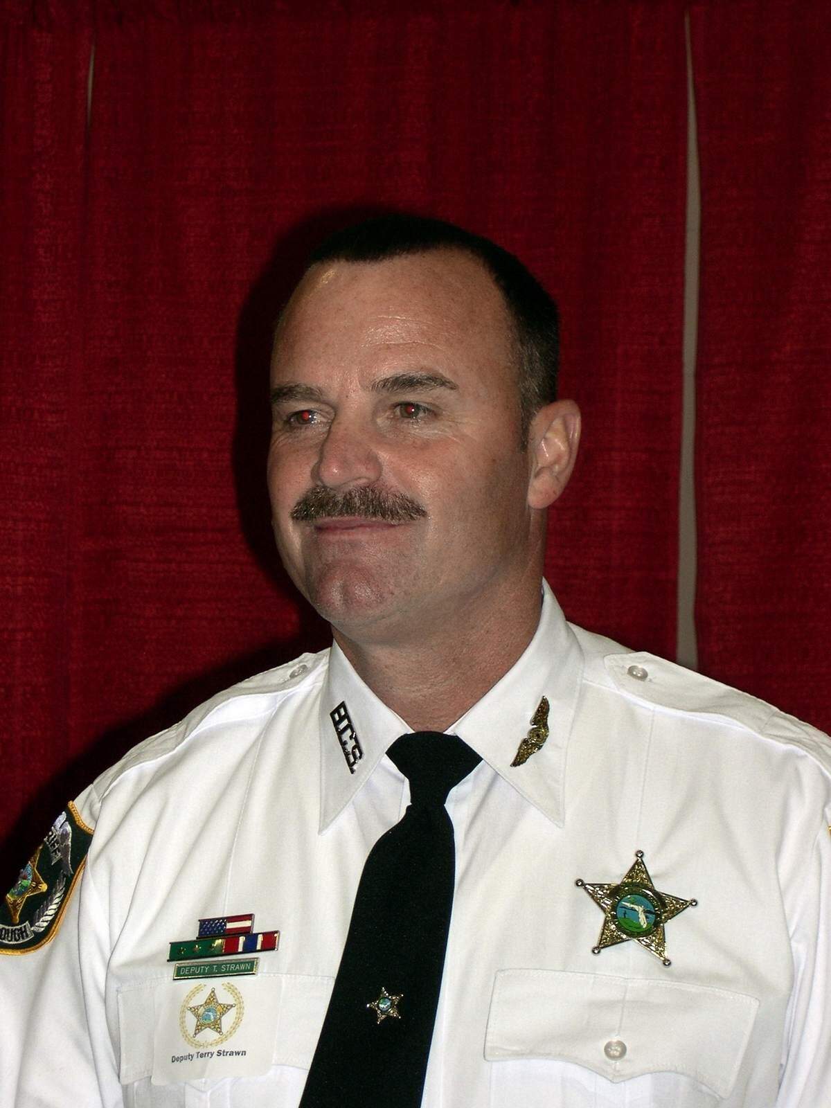Terry Strawn, who killed three relatives then himself Wednesday morning, was named Hillsborough County Deputy of the Year in 2009. He is pictured here at the awards banquet.