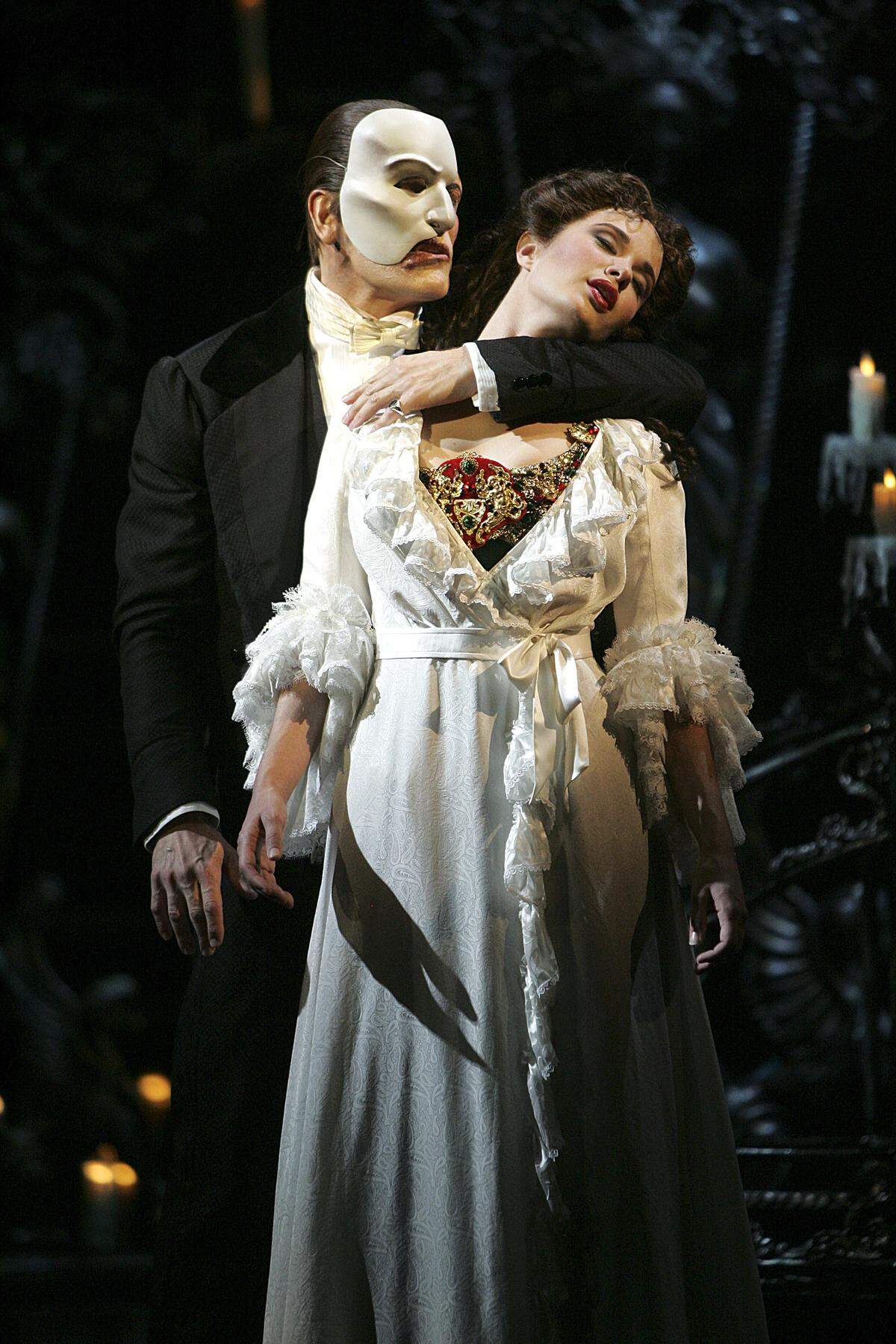 In this image provided by Kirvin Doak Communications, Anthony Crivello as The Phantom, left, and Sierra Boggess as Christine take part in a dress rehearsal of “Phantom - The Las Vegas Spectacular” in Las Vegas on Sunday, June 11, 2006. (AP Photo/Kirbin Doak Communications, Joan Marcus)
