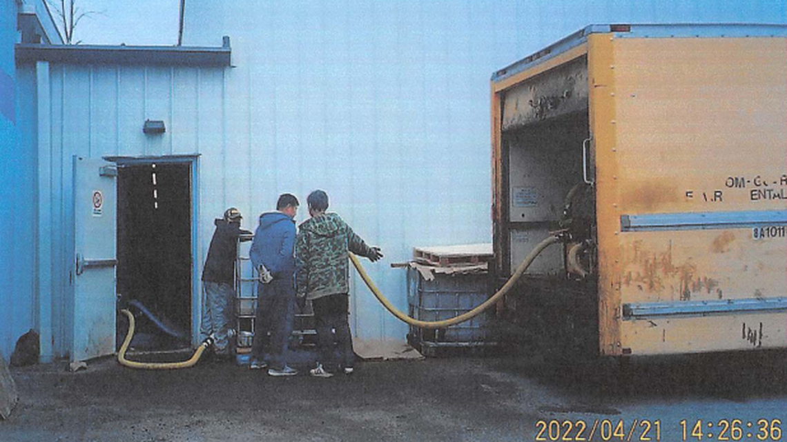 The men were seen pumping cooking oil from a truck and into a warehouse in Rochester, New York on April 21, according to court documents.