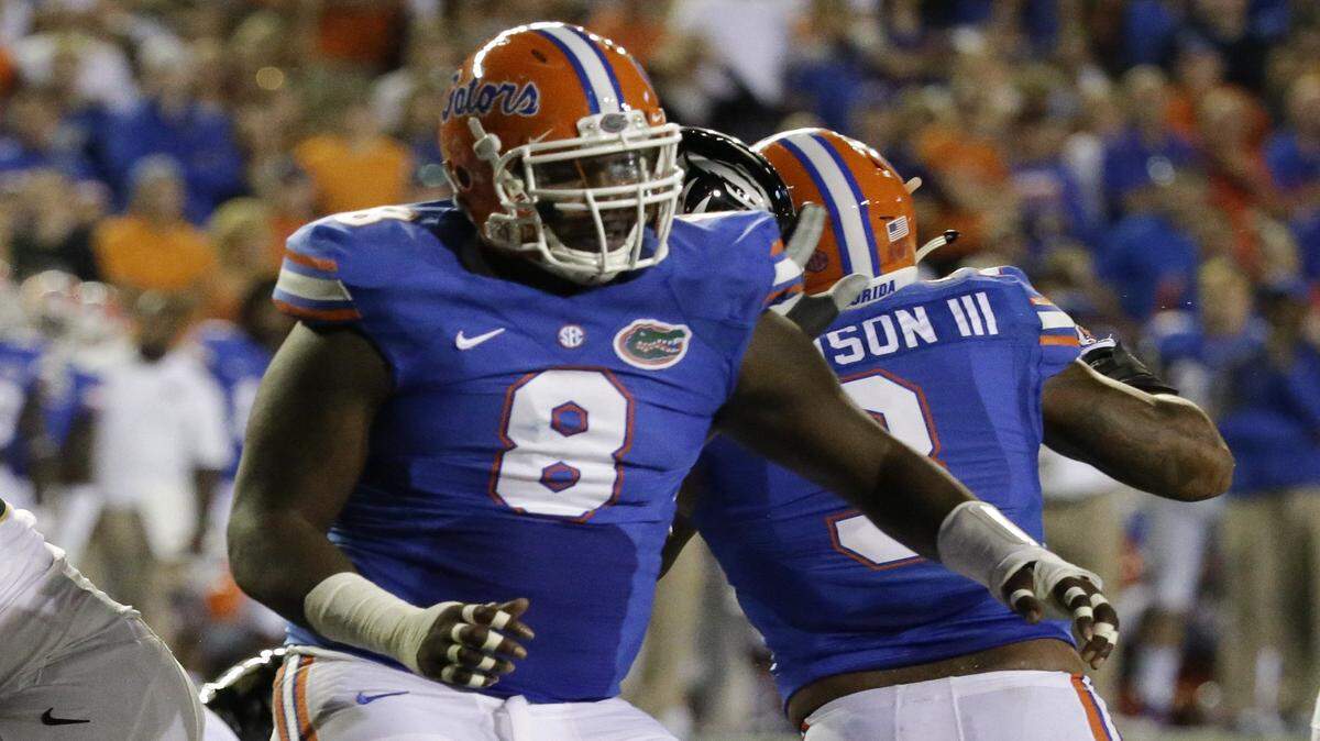 Florida defensive lineman Leon Orr (8) rushes the offense of Missouri during the first half of an NCAA college football game in Gainesville, Fla., Saturday, Oct. 18, 2014. 