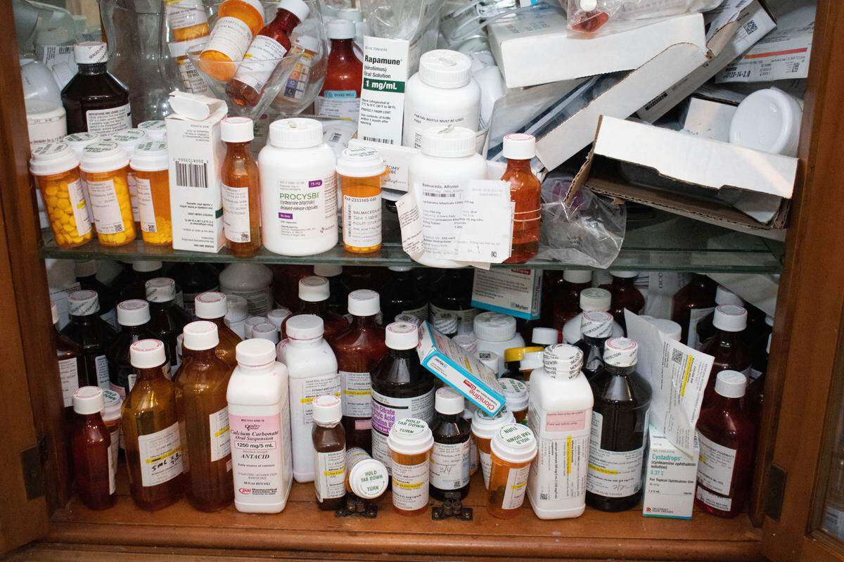 This cabinet in the Balmaceda family home is full of medications for Alfonso and Cleveland.