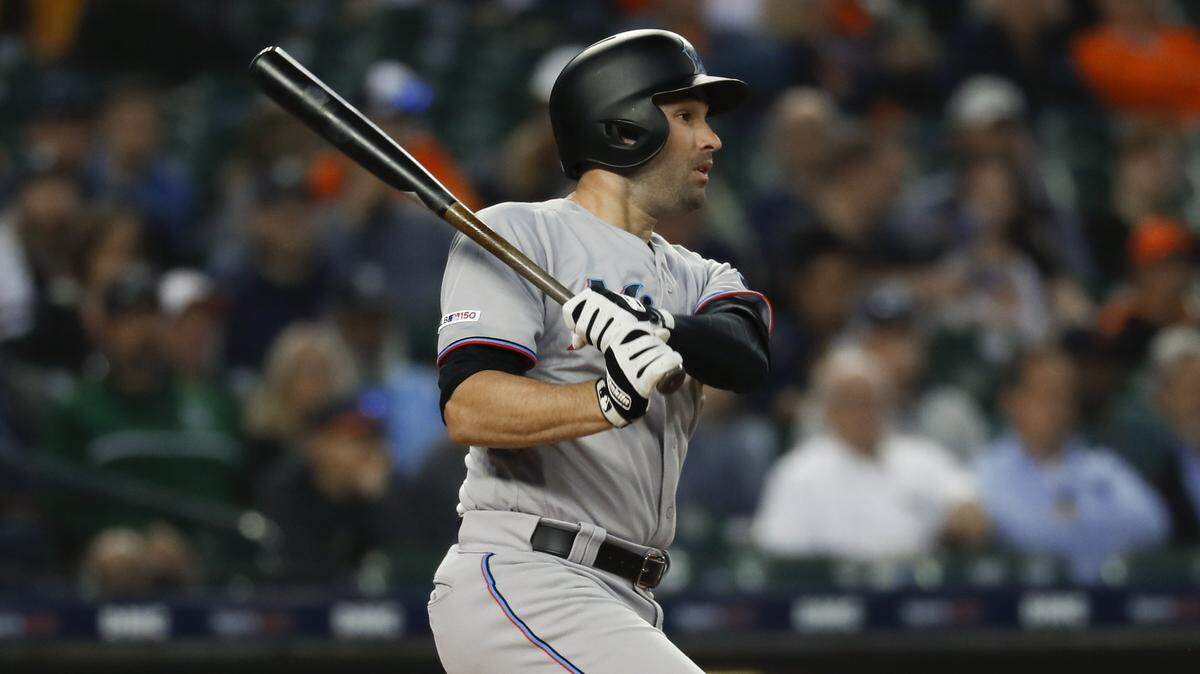 Miami Marlins’ Neil Walker hits a two-run double in the seventh inning of a baseball game against the Detroit Tigers in Detroit, Wednesday, May 22, 2019. (AP Photo/Paul Sancya)
