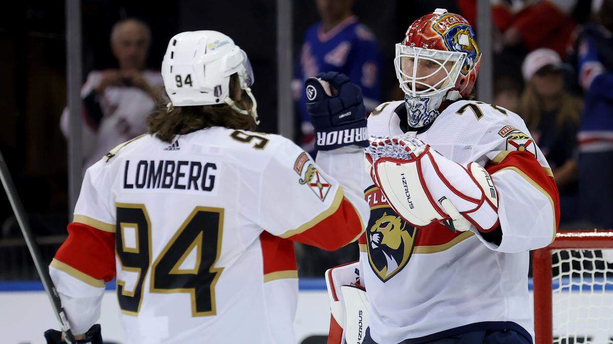 May 22, 2024; New York, New York, USA; Florida Panthers goaltender Sergei Bobrovsky (72) celebrates with left wing Ryan Lomberg (94) after defeating the New York Rangers in game one of the Eastern Conference Final of the 2024 Stanley Cup Playoffs at Madison Square Garden. Mandatory Credit: Brad Penner-USA TODAY Sports