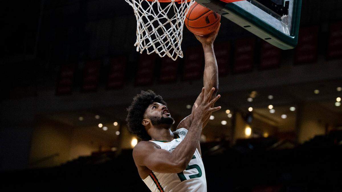 Miami Hurricanes forward Norchad Omier (15) shoots a basket during the first half of the Miami Hurricanes home opener against NJIT on Monday, Nov. 6, 2023, at the Watsco Center in Coral Gables.