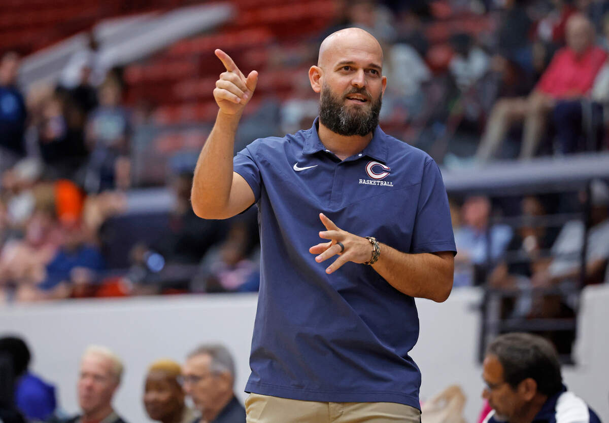 Columbus Explorers head coach Andrew Moran gestures from the bench during the game against the Colonial High School in the FHSAA semifinal at the RP Funding Center in Lakeland, Florida on Friday, March 3, 2023.