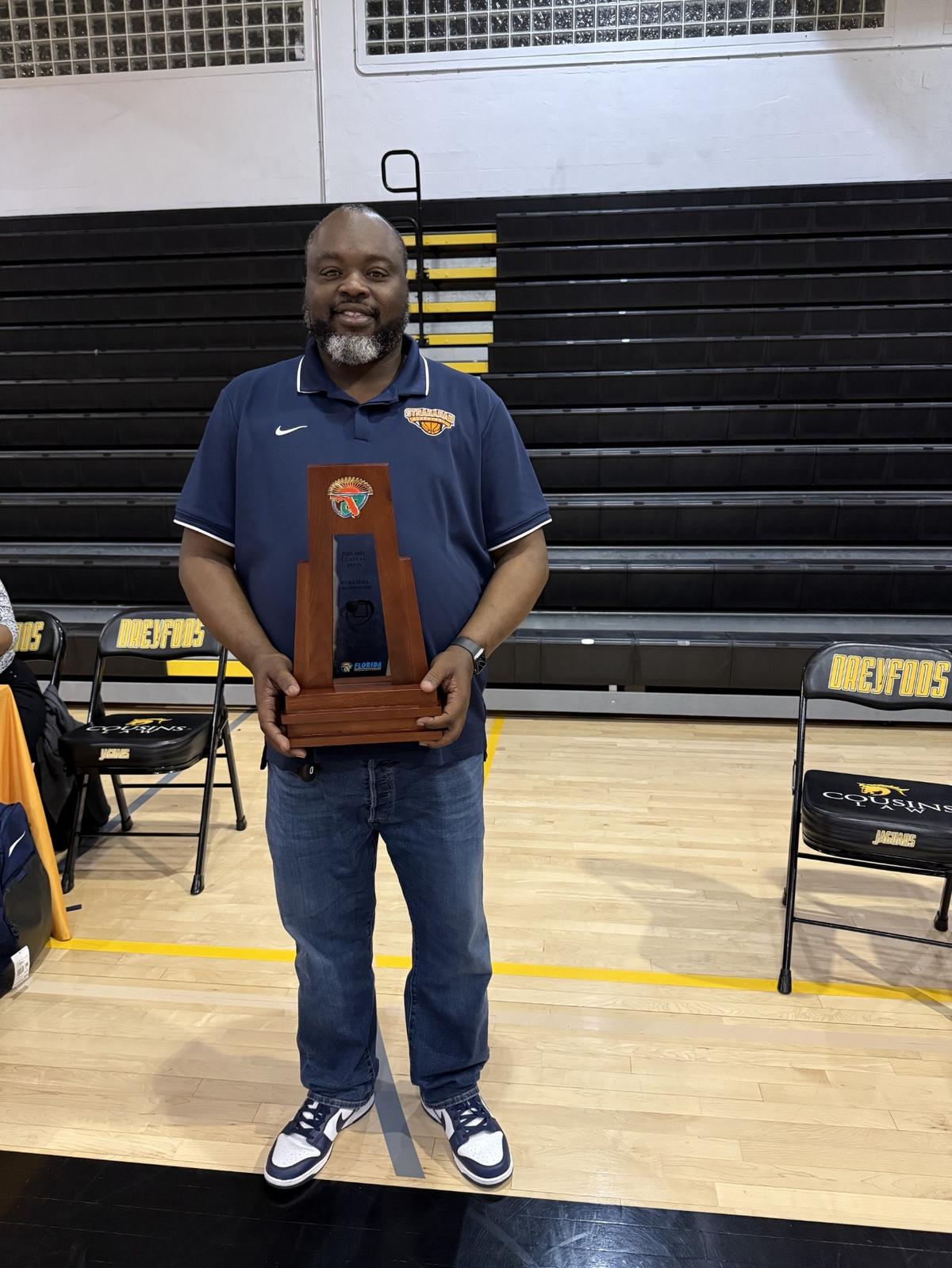 Stranahan coach Edward Schuler led the Mighty Dragons to the Class 4A state boys’ basketball championship