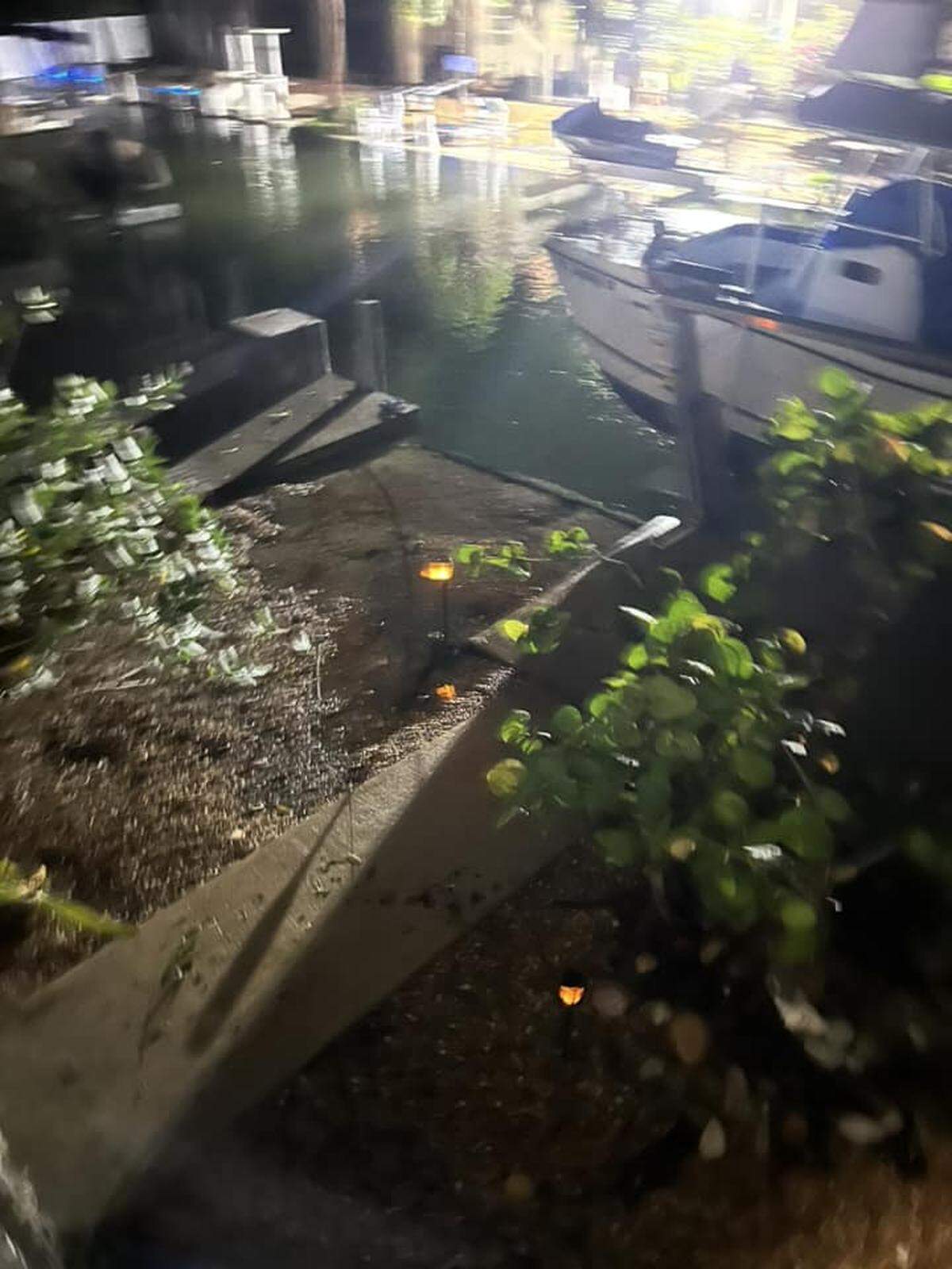 Seawater from Hurricane Helene comes over a dock on a canal in Cudjoe Key Thursday morning, Sept. 26, 2024.
