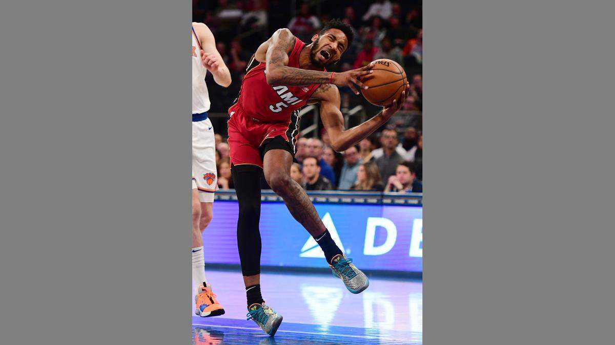 Derrick Jones Jr. #5 of the Miami Heat suffers a knee injury during the second quarter of the game against the New York Knicks at Madison Square Garden on January 27, 2019 in New York City.