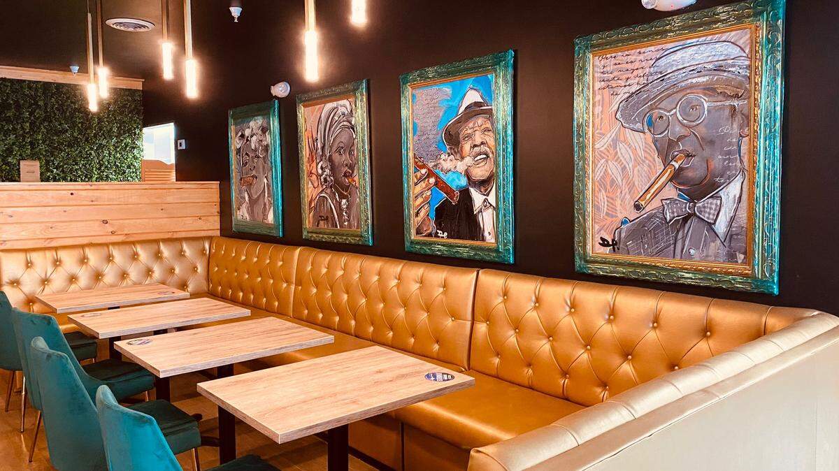 Paintings line the walls at Kuba on the Bay restaurant at Bayside.