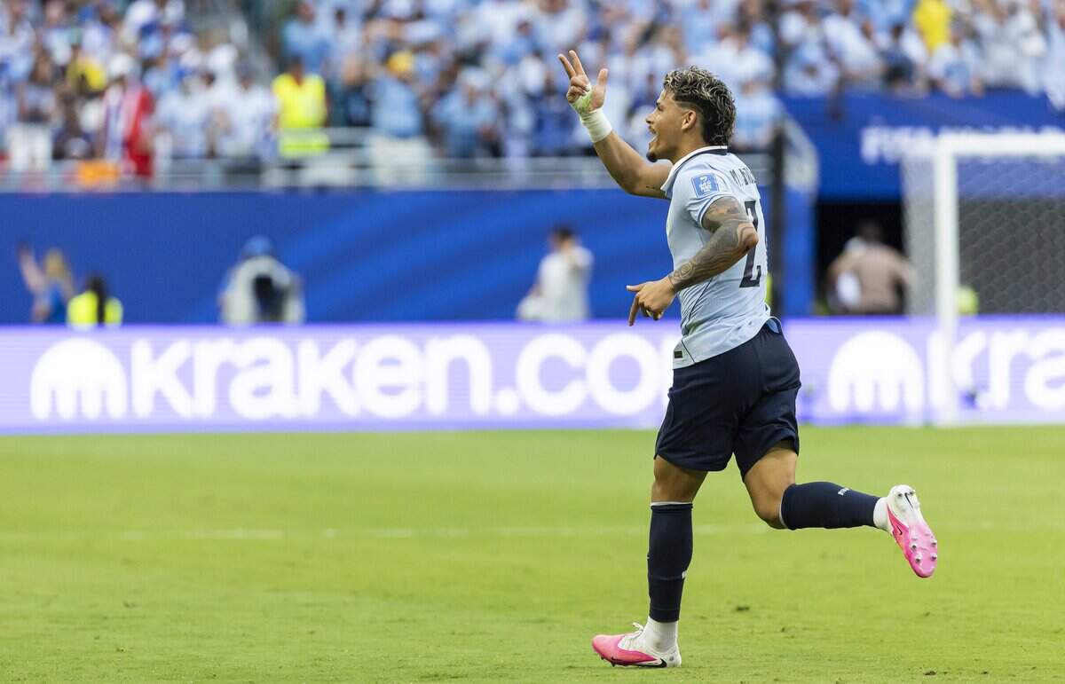 Uruguay defender Maximiliano Araújo (20) celebrates after scoring a goal against Cape Verde in the first half of their World Cup Group H soccer match at Hard Rock Stadium on Sunday, June 21, 2026, in Miami Gardens, Fla.